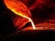 Molten iron ladle pouring castings for bench vises.